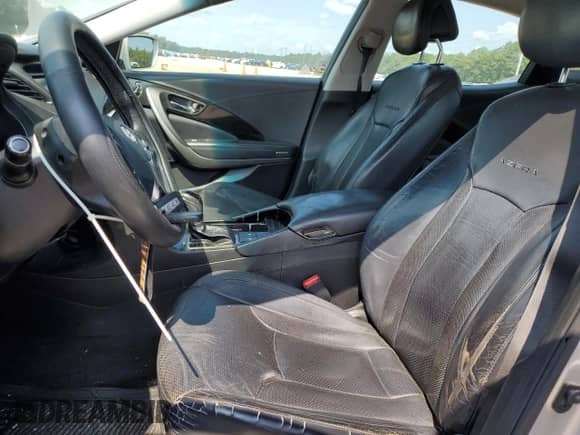 2014 Hyundai Azera с VIN KMHFG4JG6EA368463, выставлен на аукционе Copart как лот 69882895 с пробегом 143 776 миль миль и Списание • Salvage title. История ставок и продаж доступна на DreamBid. Изображение 7.