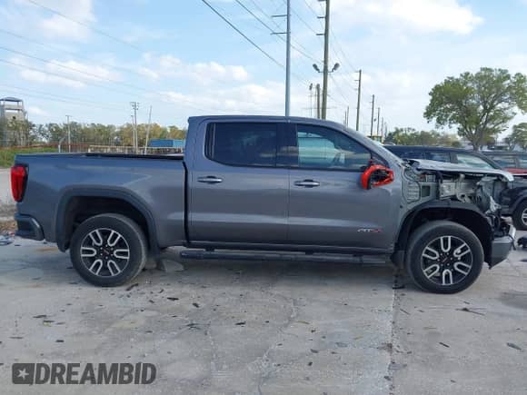 2020 GMC Sierra 1500 AT4 with VIN 3GTP9EED8LG262975, listed as a IAAI auction lot 41714606 with 23,070 mi miles and . Bid and sale history available at DreamBid. Image 14.