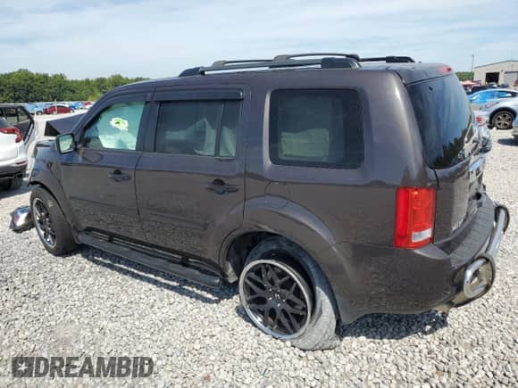 2013 Honda Pilot LX with VIN 5FNYF4H21DB083721, listed as a Copart auction lot 71104815 with 191,908 mi miles and Salvage title. Bid and sale history available at DreamBid. Image 2.