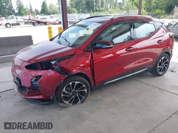 2022 Chevrolet Bolt EUV Premier z VIN 1G1FZ6S00N4117733, wystawiony jako IAAI lot #42504454 z przebiegiem 74 647 mil mil oraz . Historia ofert i sprzedaży dostępna na DreamBid. Obrazek 2.