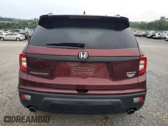 2019 Honda Passport Touring with VIN 5FNYF7H92KB000356, listed as a Copart auction lot 69598615 with 27,658 mi miles and Salvage title. Bid and sale history available at DreamBid. Image 6.