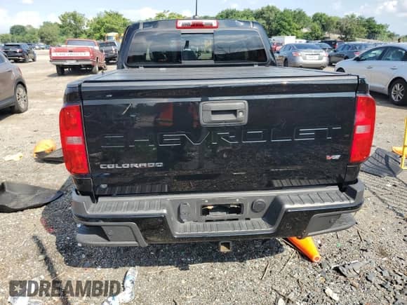 2021 Chevrolet Colorado 4WD Z71 z VIN 1GCGTDEN1M1112808, wystawiony jako Copart lot #64644555 z przebiegiem 84 751 mil mil oraz Szkoda całkowita • Salvage title. Historia ofert i sprzedaży dostępna na DreamBid. Obrazek 6.