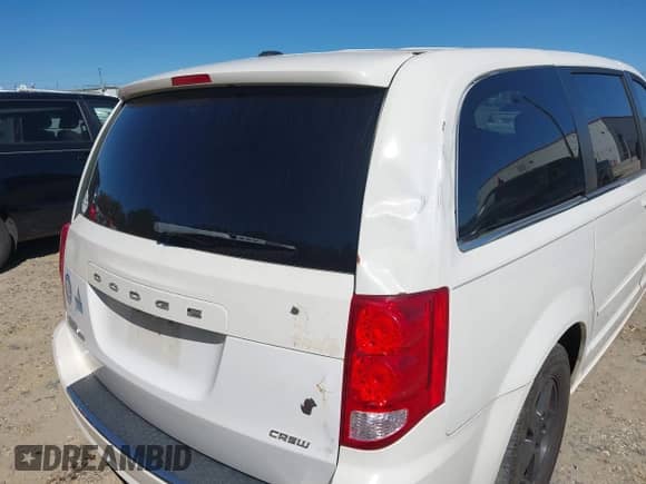 2012 Dodge Grand Caravan Crew with VIN 2C4RDGDG5CR196958, listed as a IAAI auction lot 43448521 with 165,227 mi miles and . Bid and sale history available at DreamBid. Image 13.