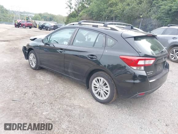 2018 Subaru Impreza Premium with VIN 4S3GTAD60J3702992, listed as a IAAI auction lot 43333897 with 132,811 mi miles and . Bid and sale history available at DreamBid. Image 3.