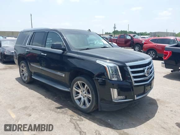 2015 Cadillac Escalade Luxury with VIN 1GYS3BKJ6FR187602, listed as a IAAI auction lot 42648552 with 164,759 mi miles and . Bid and sale history available at DreamBid. Image 1.