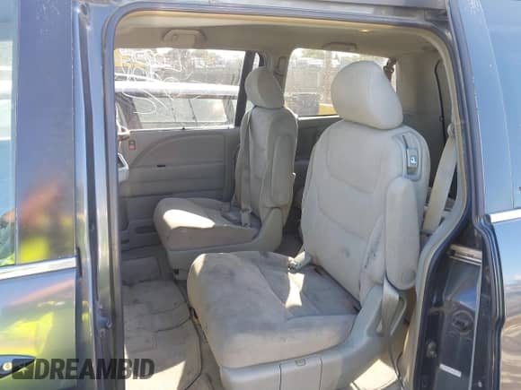 2005 Honda Odyssey EX z VIN 5FNRL38465B402508, wystawiony jako IAAI lot #43235514 z przebiegiem 194 563 mil mil oraz . Historia ofert i sprzedaży dostępna na DreamBid. Obrazek 8.