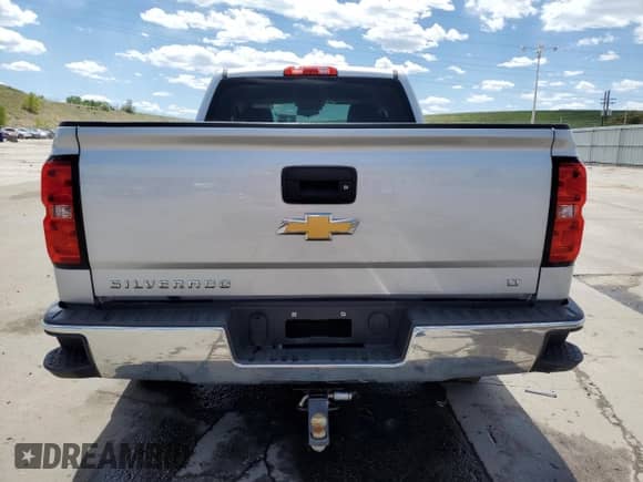 2018 Chevrolet Silverado 1500 LT z VIN 1GCVKREC0JZ180388, wystawiony jako Copart lot #56705505 z przebiegiem 113 827 mil mil oraz Szkoda całkowita • Salvage title. Historia ofert i sprzedaży dostępna na DreamBid. Obrazek 6.