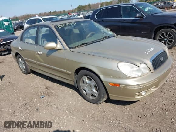 2002 Hyundai Sonata z VIN KMHWF25S32A669872, wystawiony jako IAAI lot #42112209 z przebiegiem 146 350 mil mil oraz . Historia ofert i sprzedaży dostępna na DreamBid. Obrazek 1.
