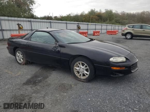 2002 Chevrolet Camaro с VIN 2G1FP22K622144128, выставлен на аукционе Copart как лот 82678755 с пробегом Не указан миль и Чистый • Clean title. История ставок и продаж доступна на DreamBid. Изображение 4.