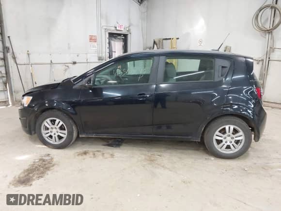 2012 Chevrolet Sonic LS with VIN 1G1JB6SH2C4217205, listed as a IAAI auction lot 43360675 with 101,863 mi miles and . Bid and sale history available at DreamBid. Image 14.