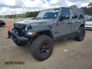 2021 Jeep Wrangler Unlimited Willys Sport with VIN 1C4HJXDG9MW788084, listed as a Copart auction lot 81259435 with 47,756 mi miles and Salvage title. Bid and sale history available at DreamBid. Image 1.