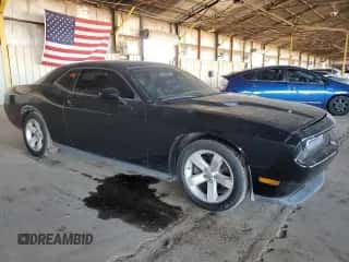 2014 Dodge Challenger SXT z VIN 2C3CDYAG5EH110982, wystawiony jako Copart lot #85419705 z przebiegiem 144 893 mil mil oraz Czysty tytuł • Clean title. Historia ofert i sprzedaży dostępna na DreamBid. Obrazek 4.