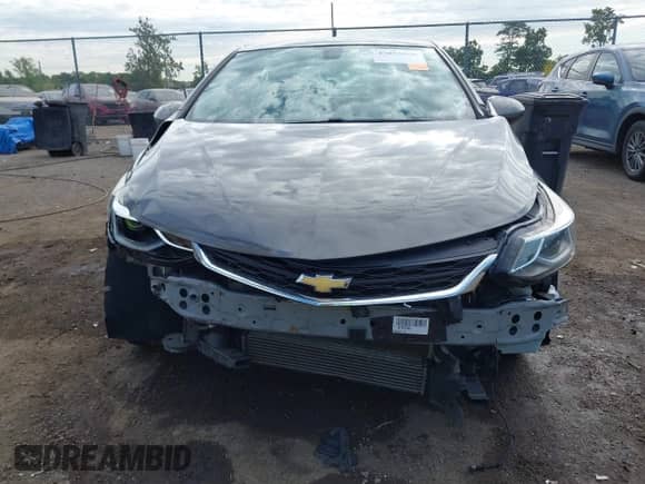 2018 Chevrolet Cruze LT z VIN 1G1BE5SMXJ7191371, wystawiony jako IAAI lot #43055956 z przebiegiem 104 565 mil mil oraz . Historia ofert i sprzedaży dostępna na DreamBid. Obrazek 6.