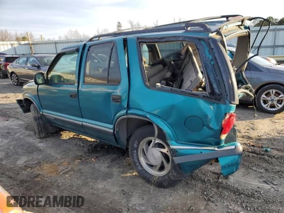 1995 Chevrolet Blazer z VIN 1GNDT13W2SK204831, wystawiony jako Copart lot #86301424 z przebiegiem 122 281 mil mil oraz Szkoda całkowita • Salvage title. Historia ofert i sprzedaży dostępna na DreamBid. Obrazek 2.
