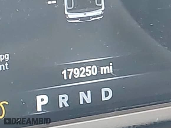 2015 Ram 1500 Laramie Longhorn with VIN 1C6RR7PM7FS606530, listed as a IAAI auction lot 42909293 with 179,250 mi miles and . Bid and sale history available at DreamBid. Image 15.