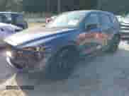 2024 Mazda CX-5 S Preferred z VIN JM3KFBCL0R0519093, wystawiony jako IAAI lot #43266404 z przebiegiem 26 726 mil mil oraz . Historia ofert i sprzedaży dostępna na DreamBid. Obrazek 2.