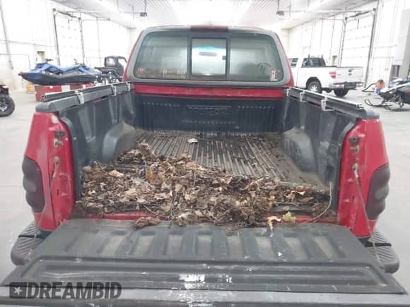 1997 Ford F-150 z VIN 1FTEX08L4VKB73578, wystawiony jako IAAI lot #43313532 z przebiegiem 231 592 mil mil oraz . Historia ofert i sprzedaży dostępna na DreamBid. Obrazek 16.