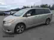 2015 Toyota Sienna LE AAS with VIN 5TDKK3DC6FS641006, listed as a Copart auction lot 69465255 with 200,844 mi miles and Clean title. Bid and sale history available at DreamBid. Image 1.