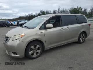 2015 Toyota Sienna LE AAS with VIN 5TDKK3DC6FS641006, listed as a Copart auction lot 69465255 with 200,844 mi miles and Clean title. Bid and sale history available at DreamBid. Image 1.