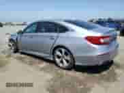 2018 Honda Accord Touring с VIN 1HGCV1F97JA140487, выставлен на аукционе Copart как лот 58018575 с пробегом 88 651 миль миль и Списание • Salvage title. История ставок и продаж доступна на DreamBid. Изображение 2.