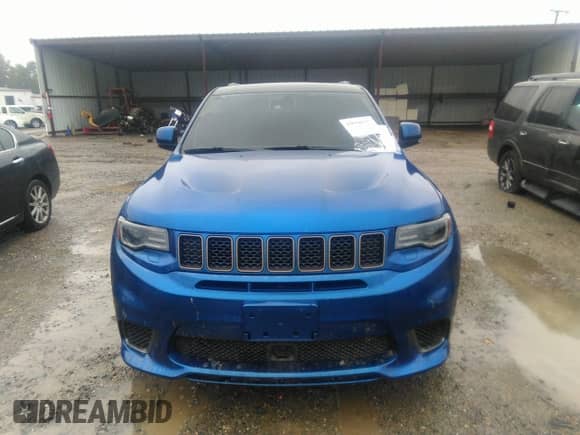 2018 Jeep Grand Cherokee Trackhawk z VIN 1C4RJFN99JC332825, wystawiony jako IAAI lot #43058737 z przebiegiem 67 252 mil mil oraz . Historia ofert i sprzedaży dostępna na DreamBid. Obrazek 12.
