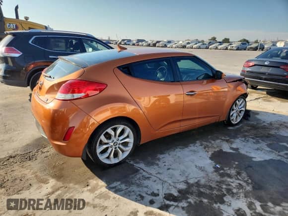 2015 Hyundai Veloster with VIN KMHTC6AD3FU219198, listed as a Copart auction lot 81516035 with 77,510 mi miles and Salvage title. Bid and sale history available at DreamBid. Image 3.