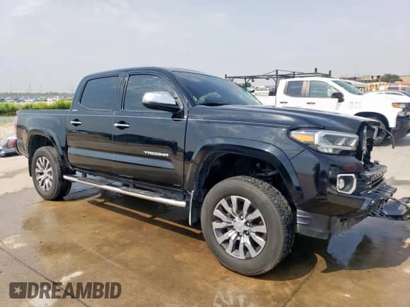 2023 Toyota Tacoma Limited с VIN 3TMEZ5CN7PM204446, выставлен на аукционе Copart как лот 57057375 с пробегом 43 738 миль миль и Списание • Salvage title. История ставок и продаж доступна на DreamBid. Изображение 4.