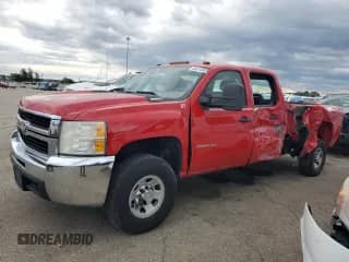 2010 Chevrolet Silverado 1500 with VIN 1GC4CZB69AF120327, listed as a Copart auction lot 56574905 with 212,686 mi miles and Salvage title. Bid and sale history available at DreamBid. Image 1.