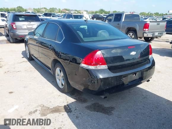 2013 Chevrolet Impala LS with VIN 2G1WA5E3XD1120124, listed as a IAAI auction lot 42360600 with 77,081 mi miles and . Bid and sale history available at DreamBid. Image 3.