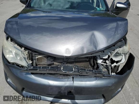 2013 Toyota Camry LE z VIN 4T1BD1FK0DU080437, wystawiony jako Copart lot #71326805 z przebiegiem 214 631 mil mil oraz Szkoda całkowita • Salvage title. Historia ofert i sprzedaży dostępna na DreamBid. Obrazek 11.