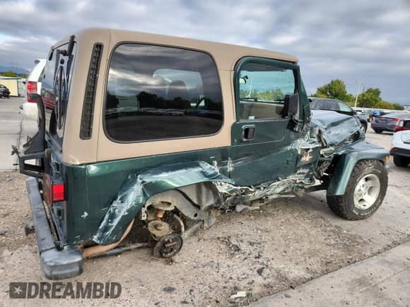 2001 Jeep Wrangler Sahara с VIN 1J4FA59S11P370224, выставлен на аукционе Copart как лот 85285925 с пробегом 87 080 миль миль и Списание • Salvage title. История ставок и продаж доступна на DreamBid. Изображение 3.