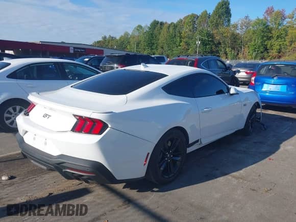 2024 Ford Mustang GT with VIN 1FA6P8CF9R5428868, listed as a IAAI auction lot 43251148 with 7,968 mi miles and . Bid and sale history available at DreamBid. Image 4.