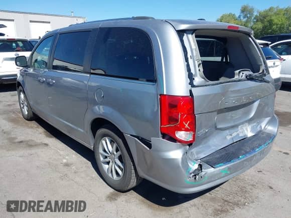 2018 Dodge Grand Caravan SXT with VIN 2C4RDGCG5JR207861, listed as a IAAI auction lot 42955827 with 125,357 mi miles and . Bid and sale history available at DreamBid. Image 3.