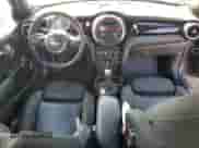 2014 MINI Hardtop with VIN WMWXM5C51ET731031, listed as a Copart auction lot 63807985 with 142,700 mi miles and Clean title. Bid and sale history available at DreamBid. Image 8.