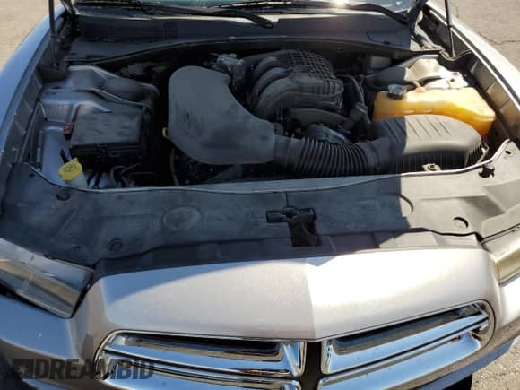 2013 Dodge Charger SE с VIN 2C3CDXBG1DH688729, выставлен на аукционе Copart как лот 69268085 с пробегом 119 779 миль миль и Списание • Salvage title. История ставок и продаж доступна на DreamBid. Изображение 11.