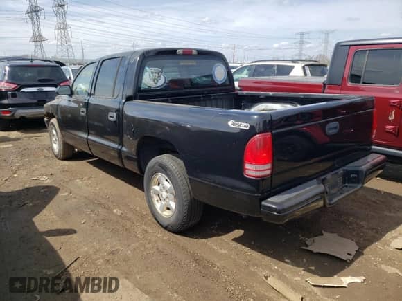 2002 Dodge Dakota Sport z VIN 1B7HL38N62S569437, wystawiony jako Copart lot #50204334 z przebiegiem Nie podano mil oraz Czysty tytuł • Clean title. Historia ofert i sprzedaży dostępna na DreamBid. Obrazek 2.