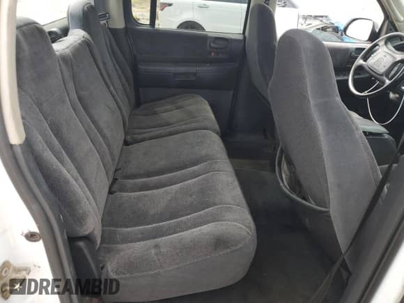 2002 Dodge Dakota Sport z VIN 1B7HL38X12S640531, wystawiony jako Copart lot #81258775 z przebiegiem 210 552 mil mil oraz Szkoda całkowita • Salvage title. Historia ofert i sprzedaży dostępna na DreamBid. Obrazek 10.