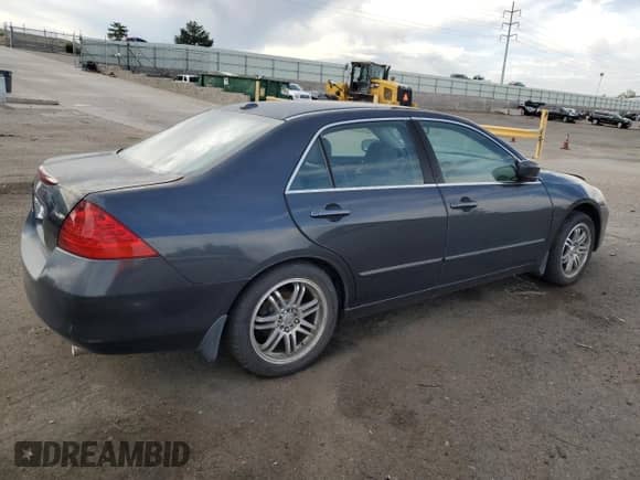 2006 Honda Accord EX-L with VIN 1HGCM65556A004509, listed as a Copart auction lot 60294005 with 147,567 mi miles and Salvage title. Bid and sale history available at DreamBid. Image 3.