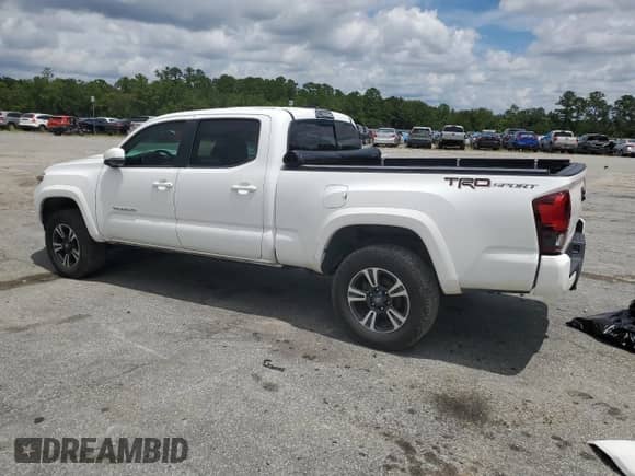 2018 Toyota Tacoma SR5 с VIN 3TMBZ5DN3JM016239, выставлен на аукционе Copart как лот 68904385 с пробегом 77 131 миль миль и Списание • Salvage title. История ставок и продаж доступна на DreamBid. Изображение 2.
