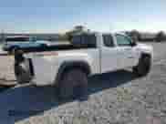 2022 Toyota Tacoma SR z VIN 3TYSZ5ANXNT090384, wystawiony jako Copart lot #80906685 z przebiegiem Nie podano mil oraz Szkoda całkowita • Salvage title. Historia ofert i sprzedaży dostępna na DreamBid. Obrazek 3.