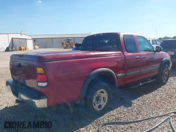 2002 Toyota Tundra SR5 with VIN 5TBRT34142S278086, listed as a IAAI auction lot 43433691 with 209,357 mi miles and . Bid and sale history available at DreamBid. Image 4.