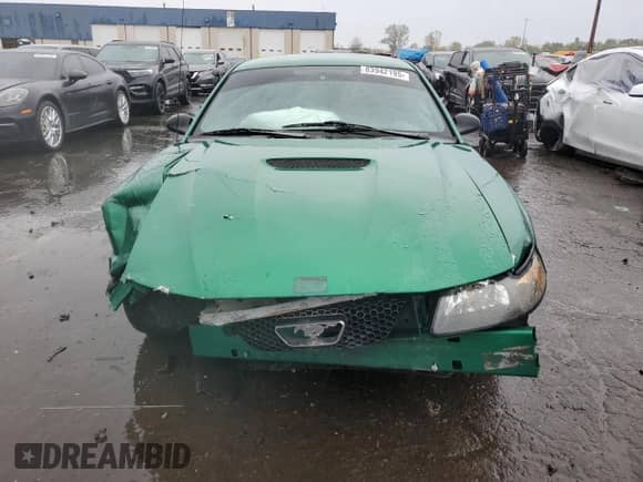 2000 Ford Mustang z VIN 1FAFP4044YF259492, wystawiony jako Copart lot #83942195 z przebiegiem Nie podano mil oraz Szkoda całkowita • Salvage title. Historia ofert i sprzedaży dostępna na DreamBid. Obrazek 5.
