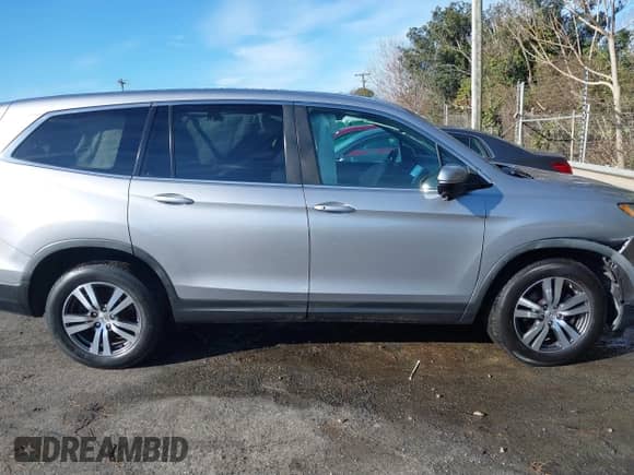2017 Honda Pilot EX with VIN 5FNYF6H43HB105219, listed as a IAAI auction lot 41206317 with 104,839 mi miles and . Bid and sale history available at DreamBid. Image 13.