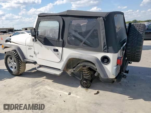 2001 Jeep Wrangler Sport с VIN 1J4FA49S01P305620, выставлен на аукционе Copart как лот 85516025 с пробегом Не указан миль и Списание • Salvage title. История ставок и продаж доступна на DreamBid. Изображение 2.
