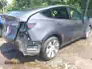 2023 Tesla Model Y z VIN 7SAYGDED7PF947357, wystawiony jako IAAI lot #42765948 z przebiegiem 16 858 mil mil oraz . Historia ofert i sprzedaży dostępna na DreamBid. Obrazek 4.