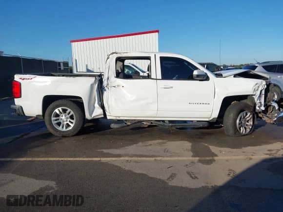2015 Chevrolet Silverado 1500 LT z VIN 3GCUKREC5FG426757, wystawiony jako IAAI lot #43444249 z przebiegiem 201 607 mil mil oraz . Historia ofert i sprzedaży dostępna na DreamBid. Obrazek 12.