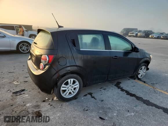 2014 Chevrolet Sonic LT с VIN 1G1JC6SH1E4169616, выставлен на аукционе Copart как лот 82540305 с пробегом 156 769 миль миль и Списание • Salvage title. История ставок и продаж доступна на DreamBid. Изображение 3.