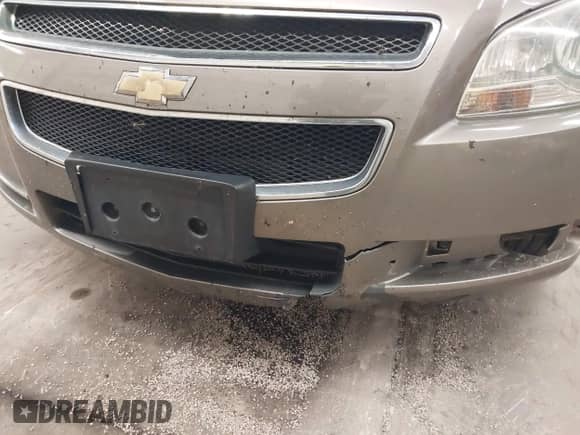 2012 Chevrolet Malibu 1LT z VIN 1G1ZC5E06CF218586, wystawiony jako IAAI lot #42838384 z przebiegiem 183 069 mil mil oraz . Historia ofert i sprzedaży dostępna na DreamBid. Obrazek 13.