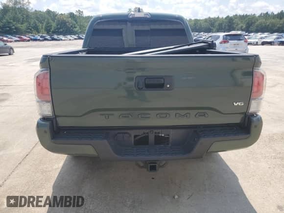 2021 Toyota Tacoma SR с VIN 5TFCZ5AN6MX245568, выставлен на аукционе Copart как лот 69282775 с пробегом 27 598 миль миль и Списание • Salvage title. История ставок и продаж доступна на DreamBid. Изображение 6.