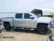 2018 Chevrolet Silverado 1500 LT z VIN 3GCUKREC5JG277050, wystawiony jako IAAI lot #42429935 z przebiegiem 151 652 mil mil oraz . Historia ofert i sprzedaży dostępna na DreamBid. Obrazek 13.